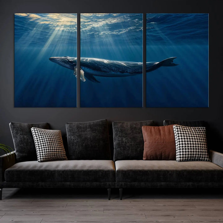 The Whale under Ocean Wall Art Canvas Print adorns the living room wall, capturing a sunlit ocean scene with a gallery-quality finish.