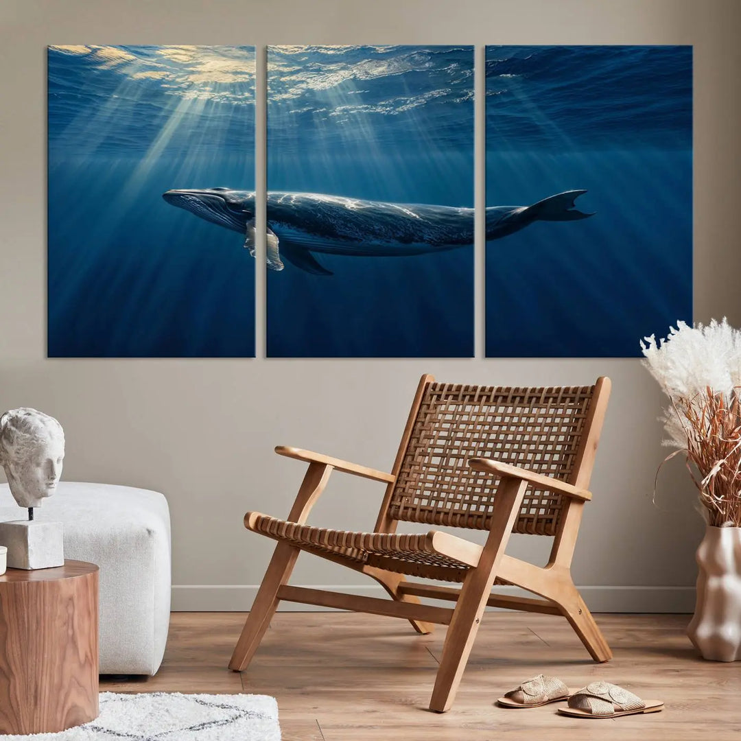 The Whale under Ocean Wall Art Canvas Print adorns the living room wall, capturing a sunlit ocean scene with a gallery-quality finish.