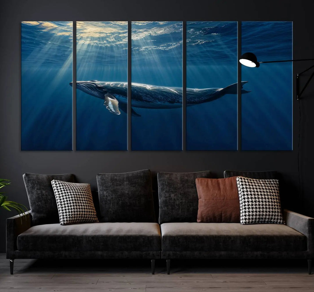 The Whale under Ocean Wall Art Canvas Print adorns the living room wall, capturing a sunlit ocean scene with a gallery-quality finish.