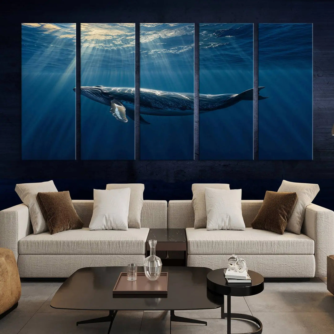 The Whale under Ocean Wall Art Canvas Print adorns the living room wall, capturing a sunlit ocean scene with a gallery-quality finish.