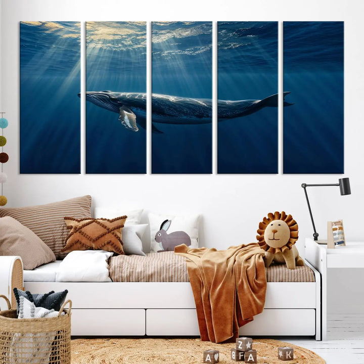 The Whale under Ocean Wall Art Canvas Print adorns the living room wall, capturing a sunlit ocean scene with a gallery-quality finish.