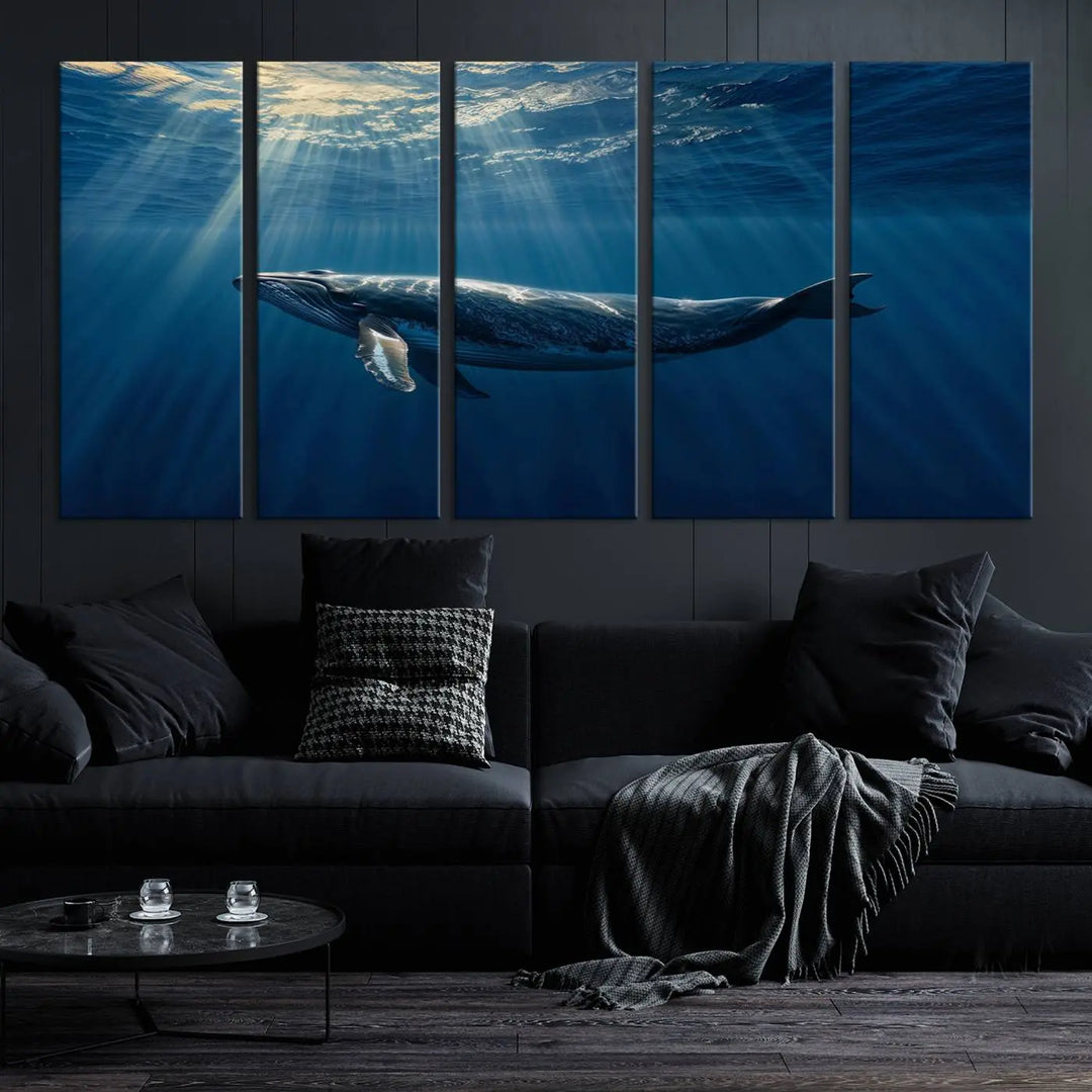 The Whale under Ocean Wall Art Canvas Print adorns the living room wall, capturing a sunlit ocean scene with a gallery-quality finish.