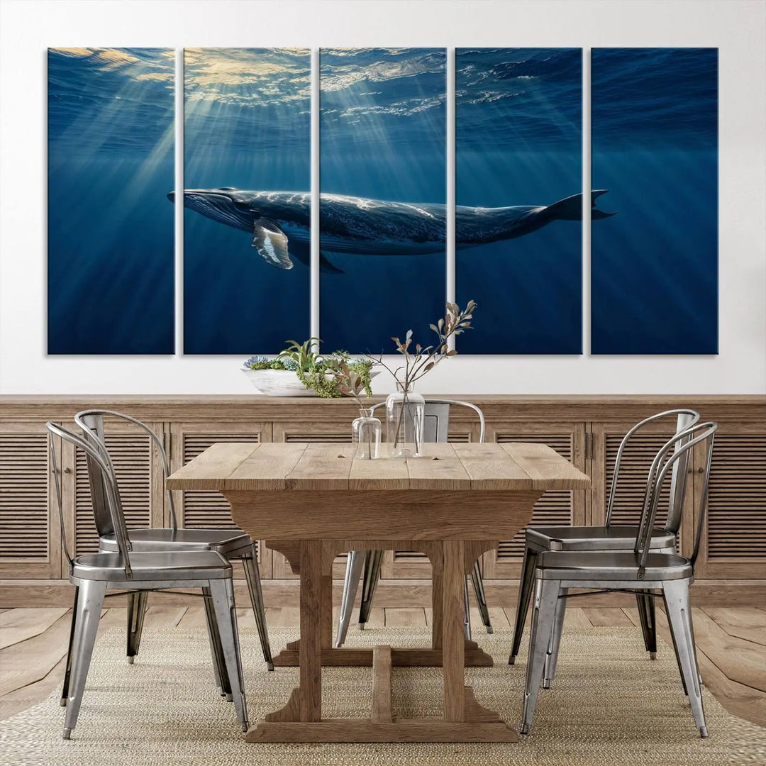 The Whale under Ocean Wall Art Canvas Print adorns the living room wall, capturing a sunlit ocean scene with a gallery-quality finish.