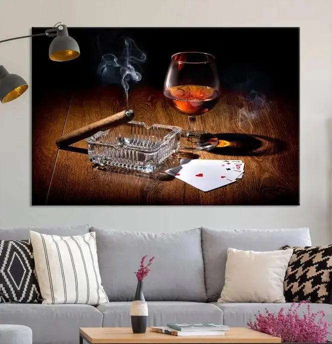 Product Named *Whiskey Cigar Wall Art Canvas Print Kitchen Wall*: Immerse yourself in triptych art depicting a cigar and smoke by an ashtray on a wooden table. This piece is crafted on museum-quality canvas and includes a UV-protective coating to maintain its vibrant appeal.