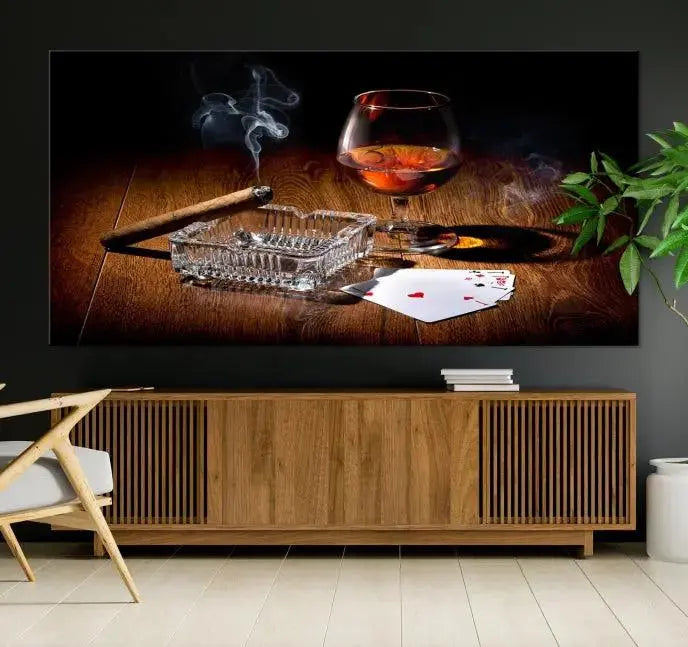 Product Named *Whiskey Cigar Wall Art Canvas Print Kitchen Wall*: Immerse yourself in triptych art depicting a cigar and smoke by an ashtray on a wooden table. This piece is crafted on museum-quality canvas and includes a UV-protective coating to maintain its vibrant appeal.