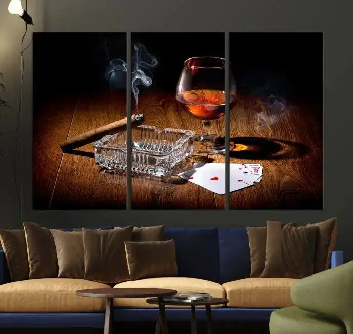 Product Named *Whiskey Cigar Wall Art Canvas Print Kitchen Wall*: Immerse yourself in triptych art depicting a cigar and smoke by an ashtray on a wooden table. This piece is crafted on museum-quality canvas and includes a UV-protective coating to maintain its vibrant appeal.