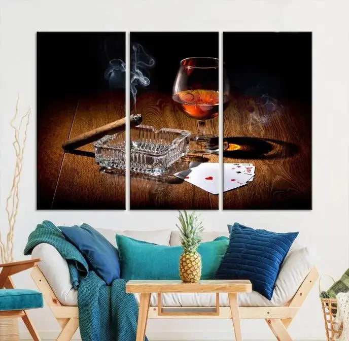 Product Named *Whiskey Cigar Wall Art Canvas Print Kitchen Wall*: Immerse yourself in triptych art depicting a cigar and smoke by an ashtray on a wooden table. This piece is crafted on museum-quality canvas and includes a UV-protective coating to maintain its vibrant appeal.