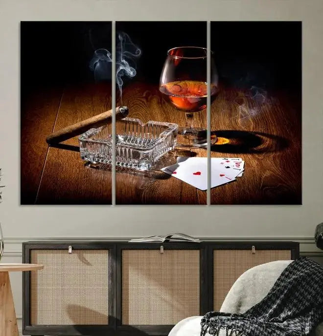 Product Named *Whiskey Cigar Wall Art Canvas Print Kitchen Wall*: Immerse yourself in triptych art depicting a cigar and smoke by an ashtray on a wooden table. This piece is crafted on museum-quality canvas and includes a UV-protective coating to maintain its vibrant appeal.