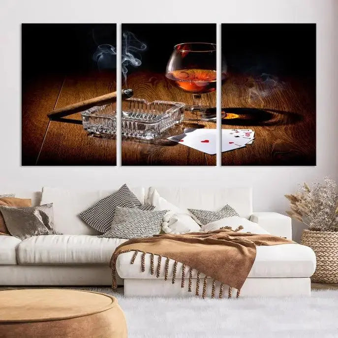 Product Named *Whiskey Cigar Wall Art Canvas Print Kitchen Wall*: Immerse yourself in triptych art depicting a cigar and smoke by an ashtray on a wooden table. This piece is crafted on museum-quality canvas and includes a UV-protective coating to maintain its vibrant appeal.