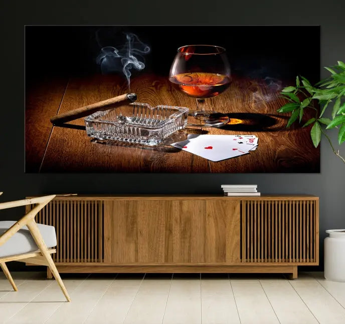 Product Named *Whiskey Cigar Wall Art Canvas Print Kitchen Wall*: Immerse yourself in triptych art depicting a cigar and smoke by an ashtray on a wooden table. This piece is crafted on museum-quality canvas and includes a UV-protective coating to maintain its vibrant appeal.