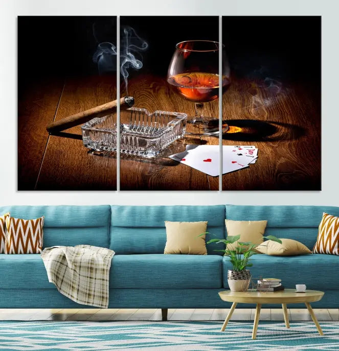 Product Named *Whiskey Cigar Wall Art Canvas Print Kitchen Wall*: Immerse yourself in triptych art depicting a cigar and smoke by an ashtray on a wooden table. This piece is crafted on museum-quality canvas and includes a UV-protective coating to maintain its vibrant appeal.