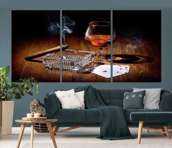 Product Named *Whiskey Cigar Wall Art Canvas Print Kitchen Wall*: Immerse yourself in triptych art depicting a cigar and smoke by an ashtray on a wooden table. This piece is crafted on museum-quality canvas and includes a UV-protective coating to maintain its vibrant appeal.