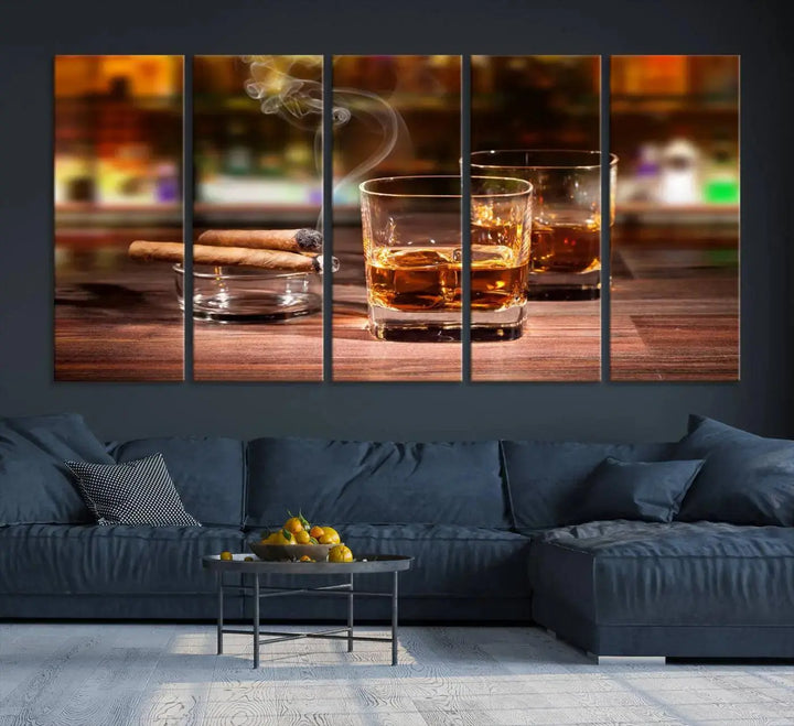 The Whiskey Cuban Cigars Canvas Print is a triptych wall art set that showcases two cigars and whiskey glasses on a wooden table. It is printed on museum-quality canvases with a UV-protective coating, designed for easy hanging.