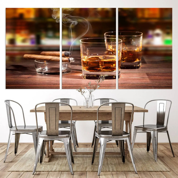 The Whiskey Cuban Cigars Canvas Print is a triptych wall art set that showcases two cigars and whiskey glasses on a wooden table. It is printed on museum-quality canvases with a UV-protective coating, designed for easy hanging.