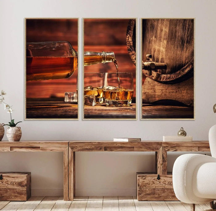 The living room features a canvas wall art depicting whiskey and cigars.