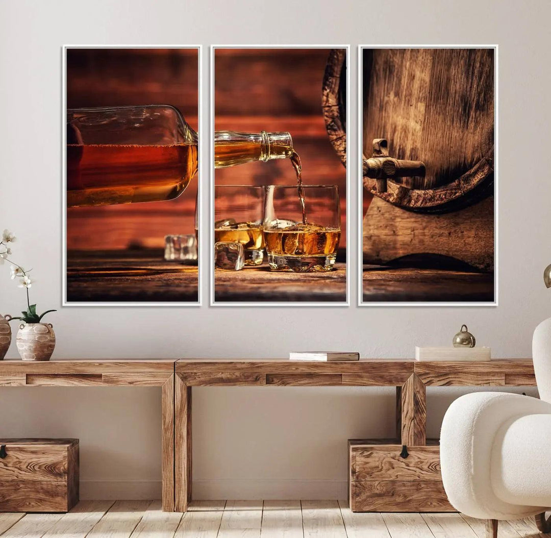 The living room features a canvas wall art depicting whiskey and cigars.