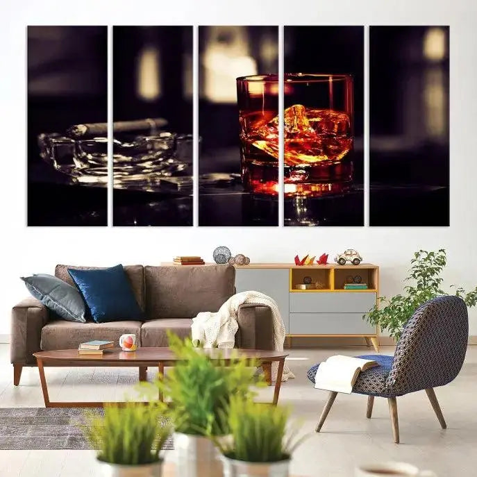 The Whiskey and Cigar Canvas, a luxurious triptych wall art for your living room or bar, portrays a whiskey glass and cigar on a table. This artwork beautifully captures the essence of opulent home decor.