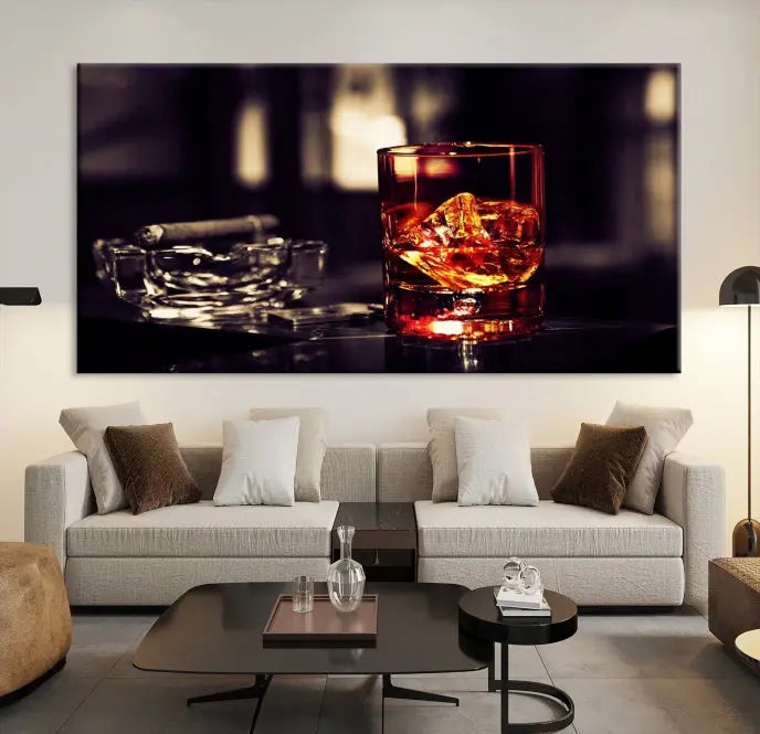 The Whiskey and Cigar Canvas, a luxurious triptych wall art for your living room or bar, portrays a whiskey glass and cigar on a table. This artwork beautifully captures the essence of opulent home decor.