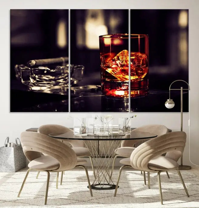 The Whiskey and Cigar Canvas, a luxurious triptych wall art for your living room or bar, portrays a whiskey glass and cigar on a table. This artwork beautifully captures the essence of opulent home decor.