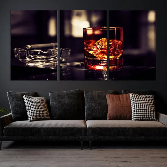 The Whiskey and Cigar Canvas, a luxurious triptych wall art for your living room or bar, portrays a whiskey glass and cigar on a table. This artwork beautifully captures the essence of opulent home decor.