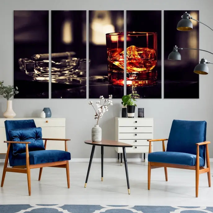 The Whiskey and Cigar Canvas, a luxurious triptych wall art for your living room or bar, portrays a whiskey glass and cigar on a table. This artwork beautifully captures the essence of opulent home decor.