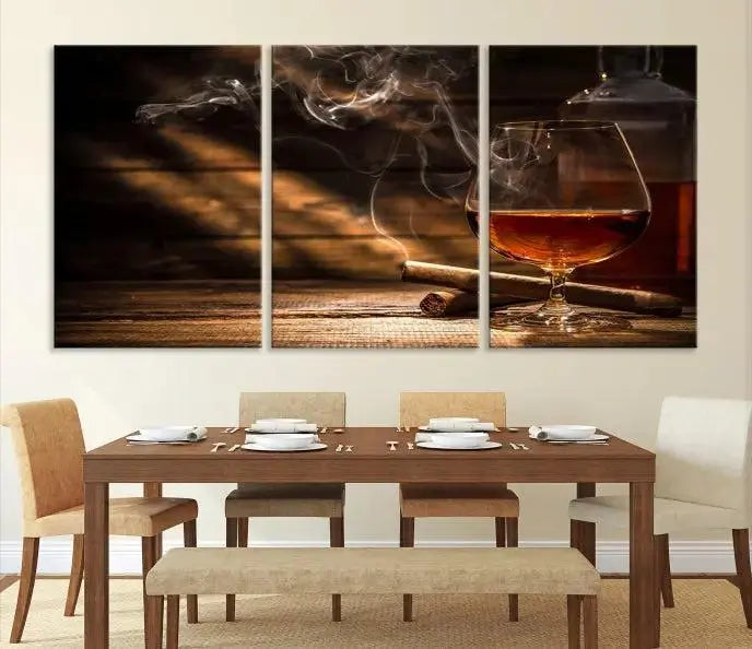 Whiskey and Cigar Wall Art Canvas Print showcases a glass of brandy, a lit cigar, and swirling smoke. This museum-quality canvas is ready to hang and features a UV-protective coating for enduring vibrancy.