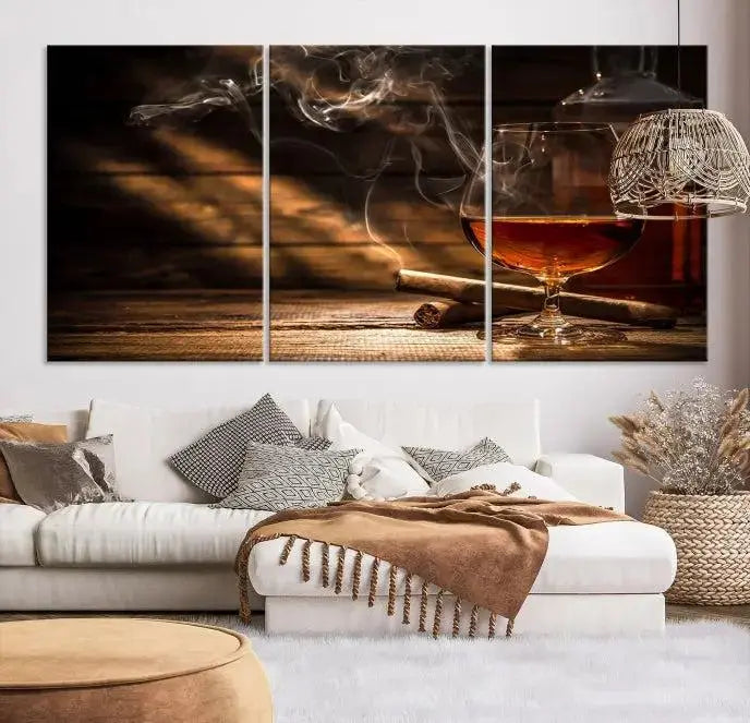 Whiskey and Cigar Wall Art Canvas Print showcases a glass of brandy, a lit cigar, and swirling smoke. This museum-quality canvas is ready to hang and features a UV-protective coating for enduring vibrancy.