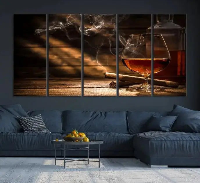 Whiskey and Cigar Wall Art Canvas Print showcases a glass of brandy, a lit cigar, and swirling smoke. This museum-quality canvas is ready to hang and features a UV-protective coating for enduring vibrancy.