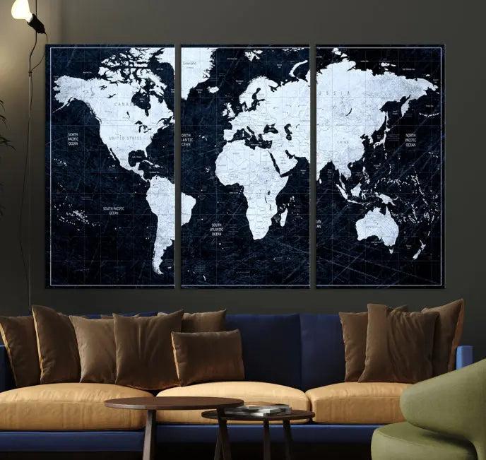 The White Colored Push Pin World Map on Jet Black Background elegantly graces the living room as triptych wall art. The museum-quality canvas pieces are meticulously crafted by a professional craftsman for lasting elegance and come ready to hang.