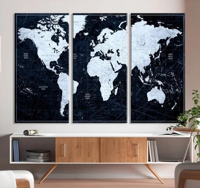 The White Colored Push Pin World Map on Jet Black Background elegantly graces the living room as triptych wall art. The museum-quality canvas pieces are meticulously crafted by a professional craftsman for lasting elegance and come ready to hang.