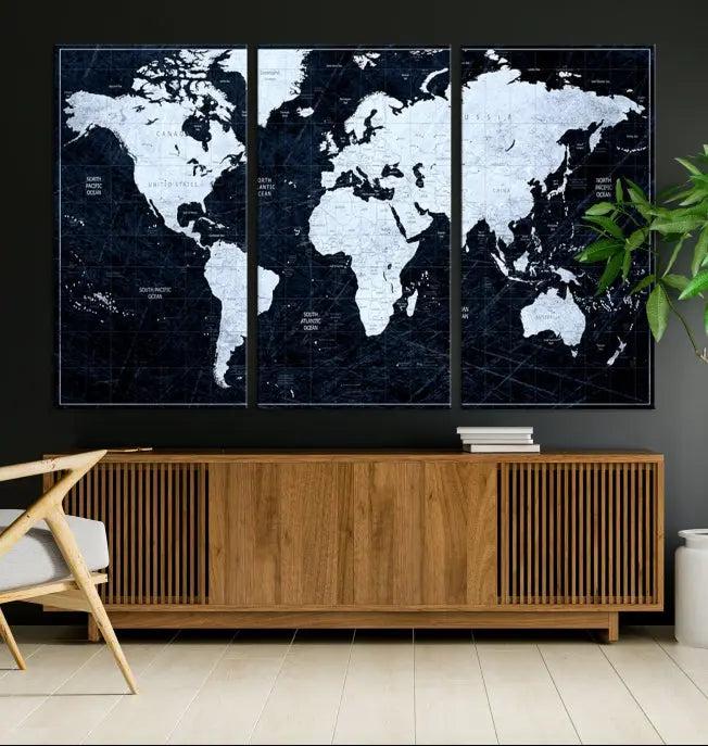 The White Colored Push Pin World Map on Jet Black Background elegantly graces the living room as triptych wall art. The museum-quality canvas pieces are meticulously crafted by a professional craftsman for lasting elegance and come ready to hang.