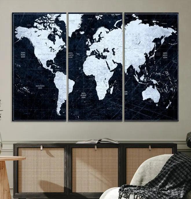 The White Colored Push Pin World Map on Jet Black Background elegantly graces the living room as triptych wall art. The museum-quality canvas pieces are meticulously crafted by a professional craftsman for lasting elegance and come ready to hang.