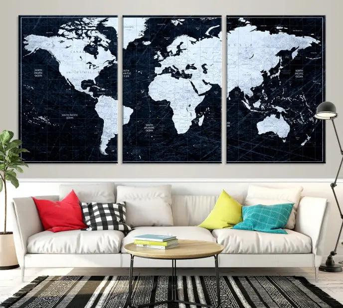 The White Colored Push Pin World Map on Jet Black Background elegantly graces the living room as triptych wall art. The museum-quality canvas pieces are meticulously crafted by a professional craftsman for lasting elegance and come ready to hang.