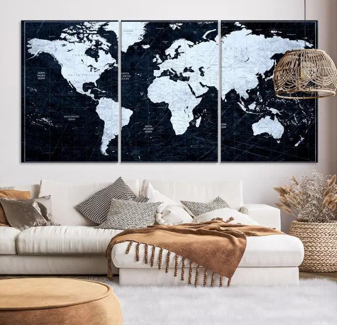 The White Colored Push Pin World Map on Jet Black Background elegantly graces the living room as triptych wall art. The museum-quality canvas pieces are meticulously crafted by a professional craftsman for lasting elegance and come ready to hang.