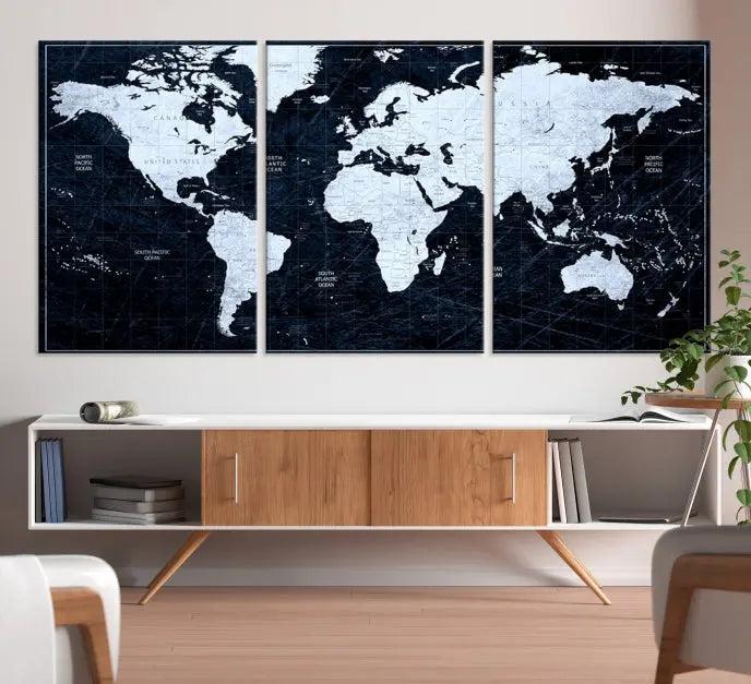 The White Colored Push Pin World Map on Jet Black Background elegantly graces the living room as triptych wall art. The museum-quality canvas pieces are meticulously crafted by a professional craftsman for lasting elegance and come ready to hang.