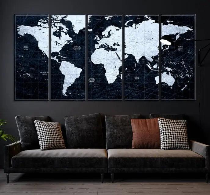 The White Colored Push Pin World Map on Jet Black Background elegantly graces the living room as triptych wall art. The museum-quality canvas pieces are meticulously crafted by a professional craftsman for lasting elegance and come ready to hang.