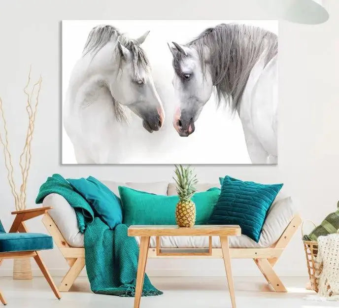 The "White Horse Wall Art Animal Canvas Print," featuring two white horses facing each other, is elegantly displayed. This triptych is gallery wrapped on museum-quality canvas, ensuring long-lasting beauty and sophistication.