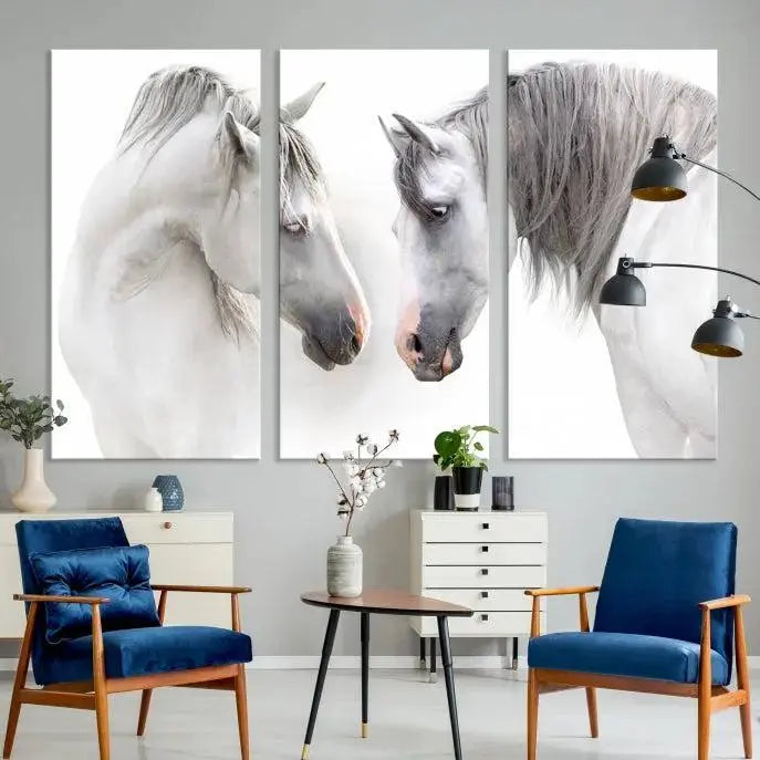 The "White Horse Wall Art Animal Canvas Print," featuring two white horses facing each other, is elegantly displayed. This triptych is gallery wrapped on museum-quality canvas, ensuring long-lasting beauty and sophistication.