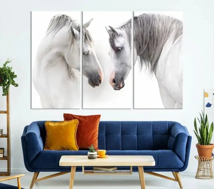 The "White Horse Wall Art Animal Canvas Print," featuring two white horses facing each other, is elegantly displayed. This triptych is gallery wrapped on museum-quality canvas, ensuring long-lasting beauty and sophistication.