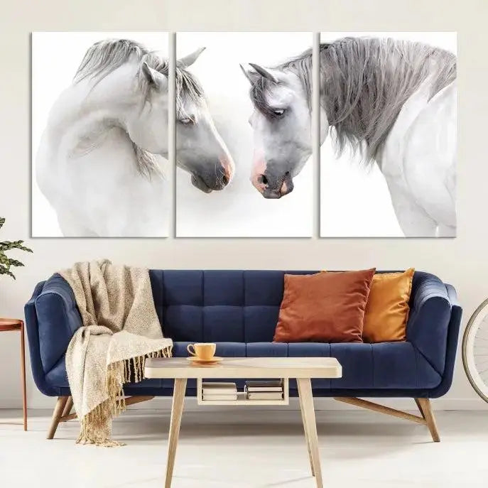 The "White Horse Wall Art Animal Canvas Print," featuring two white horses facing each other, is elegantly displayed. This triptych is gallery wrapped on museum-quality canvas, ensuring long-lasting beauty and sophistication.