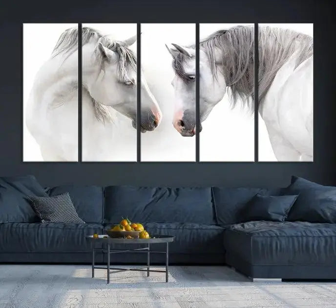 The "White Horse Wall Art Animal Canvas Print," featuring two white horses facing each other, is elegantly displayed. This triptych is gallery wrapped on museum-quality canvas, ensuring long-lasting beauty and sophistication.