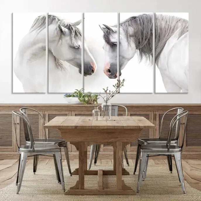 The "White Horse Wall Art Animal Canvas Print," featuring two white horses facing each other, is elegantly displayed. This triptych is gallery wrapped on museum-quality canvas, ensuring long-lasting beauty and sophistication.