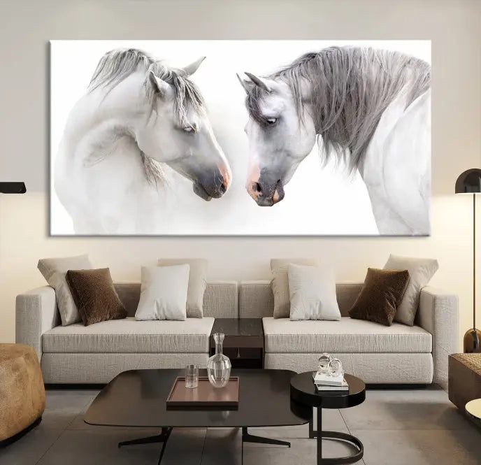 The "White Horse Wall Art Animal Canvas Print," featuring two white horses facing each other, is elegantly displayed. This triptych is gallery wrapped on museum-quality canvas, ensuring long-lasting beauty and sophistication.