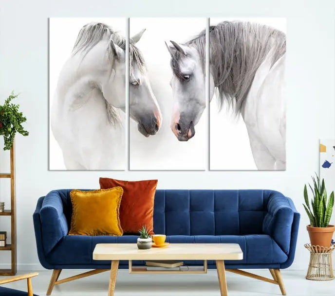 The "White Horse Wall Art Animal Canvas Print," featuring two white horses facing each other, is elegantly displayed. This triptych is gallery wrapped on museum-quality canvas, ensuring long-lasting beauty and sophistication.