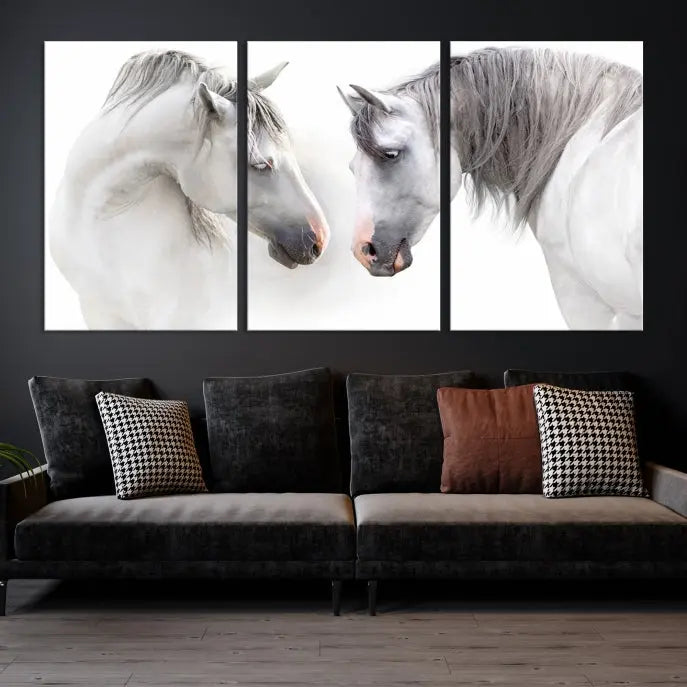 The "White Horse Wall Art Animal Canvas Print," featuring two white horses facing each other, is elegantly displayed. This triptych is gallery wrapped on museum-quality canvas, ensuring long-lasting beauty and sophistication.