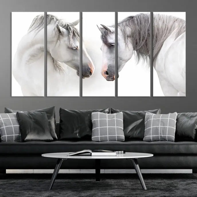 The "White Horse Wall Art Animal Canvas Print," featuring two white horses facing each other, is elegantly displayed. This triptych is gallery wrapped on museum-quality canvas, ensuring long-lasting beauty and sophistication.