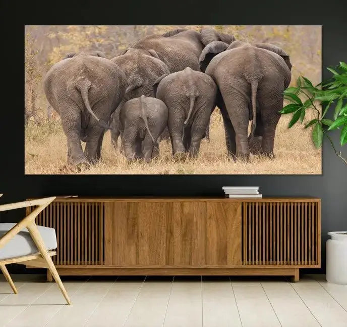 The "Wild Elephant Wall Art Canvas Print" features a triptych of elephants walking away, presented on museum-quality canvas with a UV-protective coating.