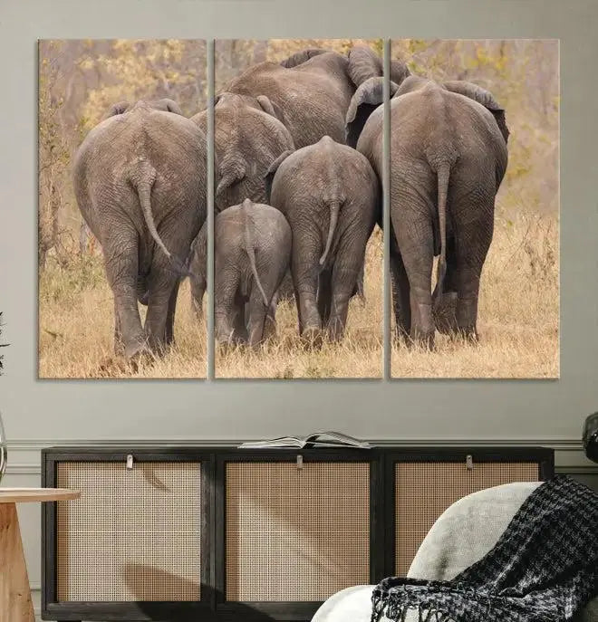 The "Wild Elephant Wall Art Canvas Print" features a triptych of elephants walking away, presented on museum-quality canvas with a UV-protective coating.