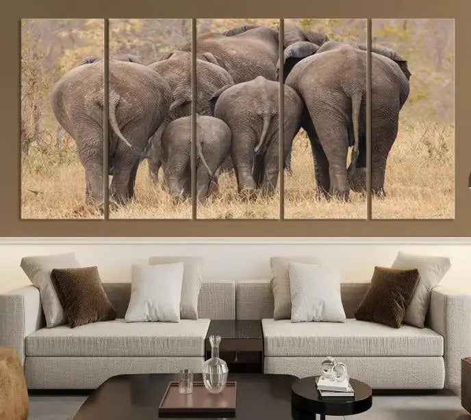 The "Wild Elephant Wall Art Canvas Print" features a triptych of elephants walking away, presented on museum-quality canvas with a UV-protective coating.