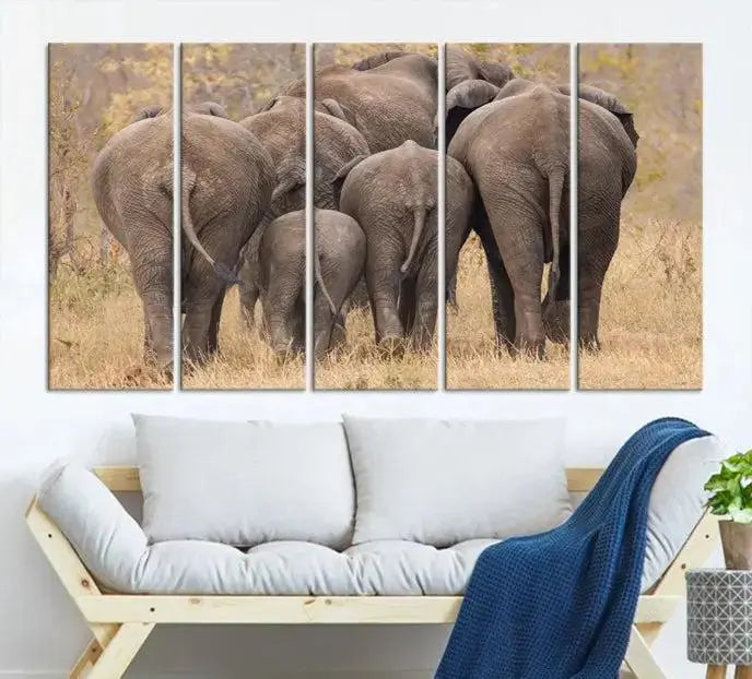 The "Wild Elephant Wall Art Canvas Print" features a triptych of elephants walking away, presented on museum-quality canvas with a UV-protective coating.